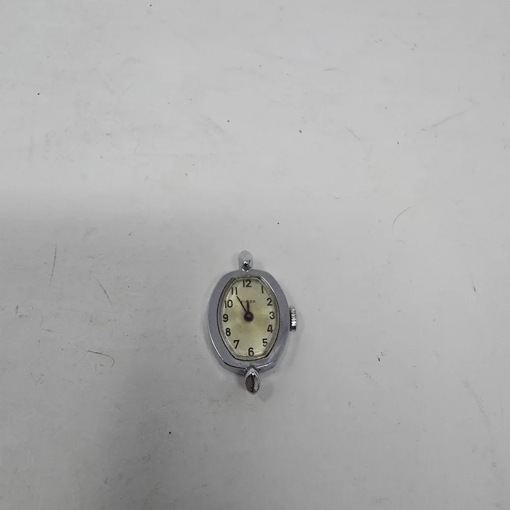 Vintage Timex Womens Oval Watch Face Silver Tone Chrome Plated Base Metal Bezel